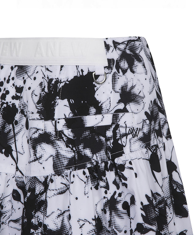 ANEW Golf Women Shirring DTP Point Flare Skirt in White with floral pattern and flared hem design.
